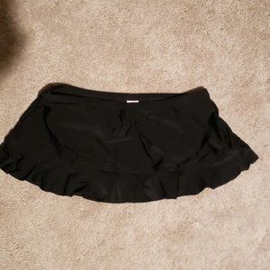Never worn Swim skirt with attached full coverage bikini bottom. Small